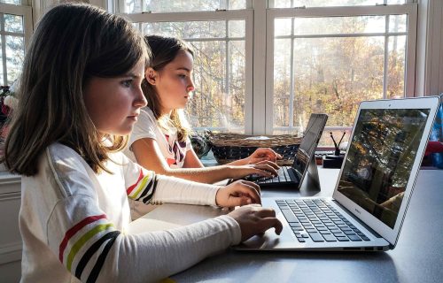 generation-z-kids-using-technology-for-school-work-2023-11-27-05-13-49-utc
